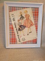 Framed sewing pattern artwork front view