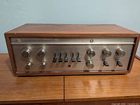 Front view of Luxman CL-350 showing full faceplate and wood cabinet