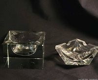 Cube and faceted ashtrays side by side