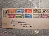 Full view of envelope with all 12 Newfoundland stamps