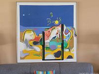 Full view of framed square acrylic painting on wall