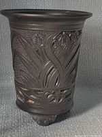 frontal view showing pierced foliate decoration and form