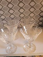 Six matching Stuart Crystal Darlington stem glasses front view