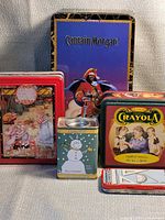 Group shot showing all seven tins