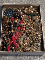 Box containing assorted pearl, resin and glass bead necklaces plus bangle
