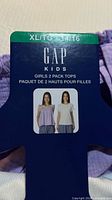 Front of package tag showing Gap Kids Girls 2 Pack Tops XL 14/16