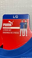 Retail hanger tag showing Puma Kids 2-Piece Set size L/G