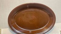 Top view of brown Fiesta oval platter
