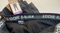 Waistband showing Eddie Bauer branding and inner fleece lining
