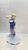 Front view of Paula figurine in blue gown