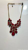 Full view of the ruby red statement necklace