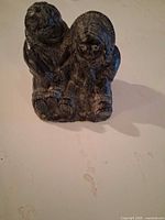 Front view of Inuit children figurine