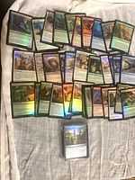 Spread of foil Magic: The Gathering cards showing variety and holographic finish