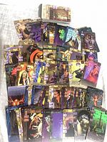 Spread of numerous Heresy cards showing fronts, varied artwork