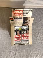 Open display box showing sealed packs and interior flap graphics