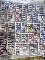 Group shot of all 35 red parallel Game Ticket cards