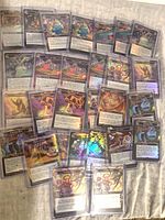 Group view of sleeved Unfinity foil cards