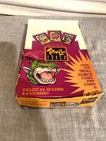 Front of Troll Force display box showing artwork and slogans