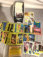 Overview of loose TMNT cards spread out with storage box