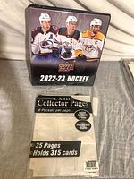 Front view of Upper Deck binder and sealed pack of pages