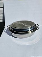 Roasting pan with lid, showing overall shape and handles