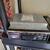 Oblique view of module front showing display, cassette slot and controls