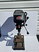 Front view of Jobmate benchtop drill press showing full unit