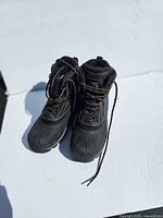 Front view of both boots showing uppers and laces