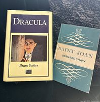 Front covers of both books: Dracula and Saint Joan
