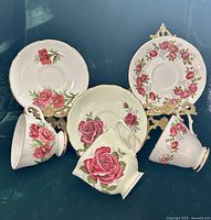 All three teacup and saucer sets displayed