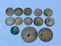 Front view of all 13 coins