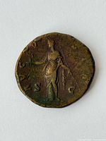Obverse and reverse details of bronze Sestertius coin