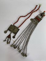 Both jewelry pieces laid out showing full length and design