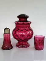Jar, sugar shaker, and tumbler side by side showing size and color