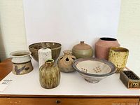 Group shot of all pottery pieces on table