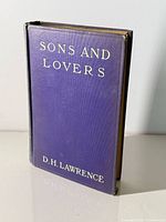 Front cover showing title and author on purple cloth binding