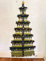 Full view of woven Christmas tree wall hanging on wall
