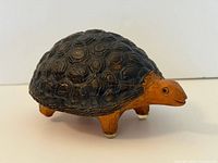 full view of turtle coin bank profile