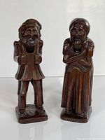 Front view of both carved wood nutcrackers