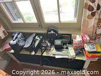Overview of all camera equipment on windowsill