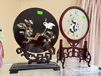 Both rotating table screens on stands