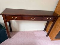 Full view of wood console table front