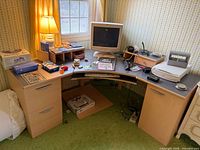 Full view of the assembled three-piece desk with drawers, corner, and return