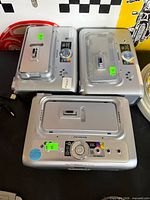Three Kodak EasyShare printer docks displayed together