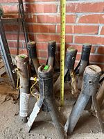 Seven jack stands upright showing height tape