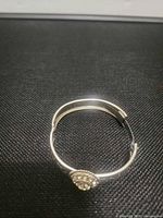 Bangle bracelet closed showing rhinestone accent