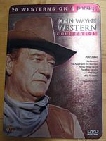 Front of metallic tin showing John Wayne portrait and collection details