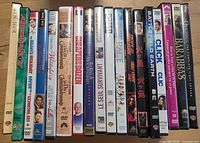 Single photo showing all DVD spines lined up to identify titles and count