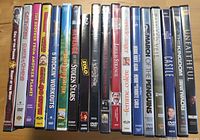 Front spines of 19 DVD cases showing assorted titles