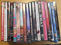 Spine view of all DVD cases lined in a row
